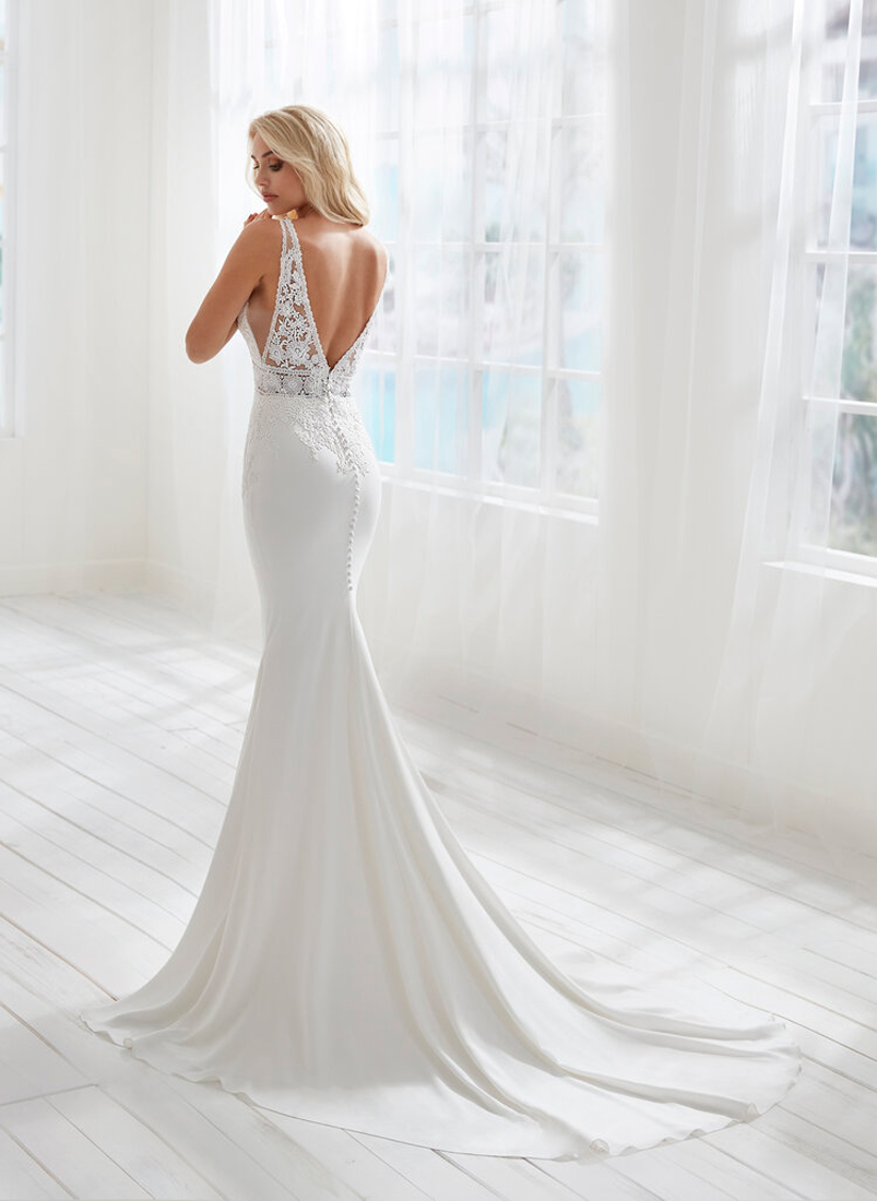 A Fitted Gown with a Flare Train - Bridal and Formal